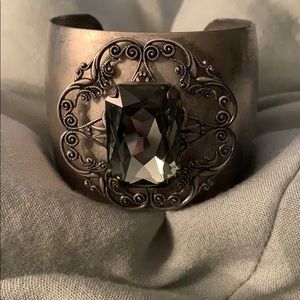 Silver and green stone cuff bracelet.